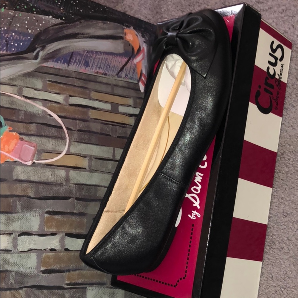 Black flat bow ballet slip ins